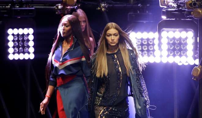 Versace favourites Gigi Hadid and Naomi Campbell. Photo: Reuters /Max Rossi