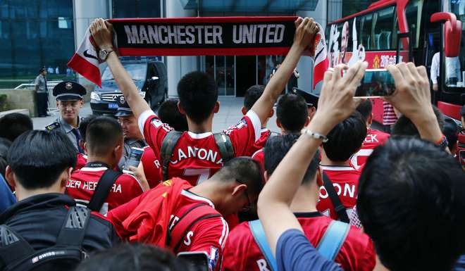 Manchester United fans outside the team’s Beijing hotel in July this year. Photo: Reuters