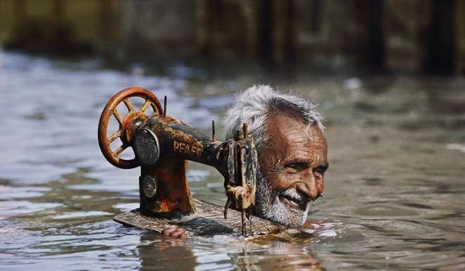 Tailor in Monsoon, Porbandar, India, 1983. Photo: Steve McCurry