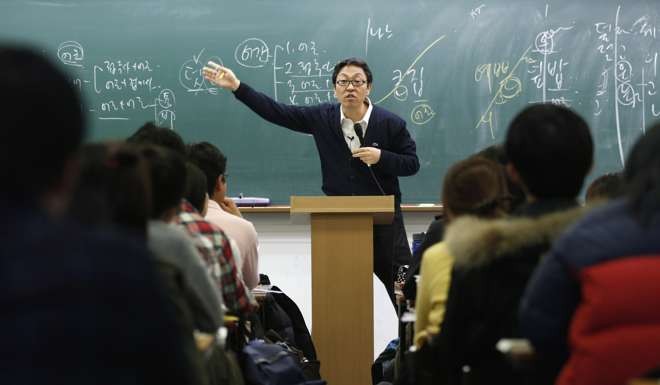 The law, which comes into effect on Wednesday, will make it illegal for private school teachers to accept meals worth 30,000 won (US$26) or more. Photo: Reuters