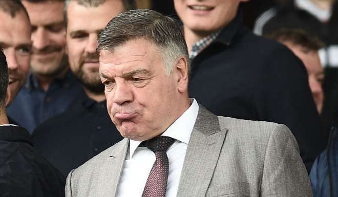 This file photo taken on September 10, 2016 shows England manager Sam Allardyce as he arrives for the English Premier League football match between Manchester United and Manchester City at Old Trafford in Manchester, north west England. Allardyce's reign as England manager came to a humiliating end on September 27, 2016, as he departed after just 67 days in charge following his controversial comments in a newspaper sting. Allardyce's reign was sensationally brought to a close as he paid the price for indiscreetly talking with undercover Daily Telegraph reporters posing as Far East businessmen. / AFP PHOTO / Oli SCARFF