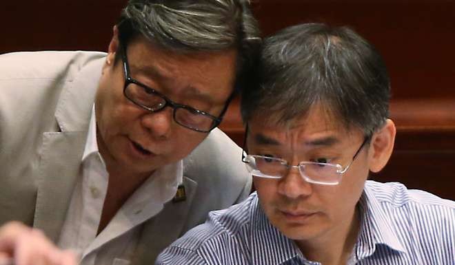 Former lawmakers Wong Yuk-man and Leung Ka-lau, the medical sector representative, attending a Legco meeting in June. Both opposed the bill. David Wong