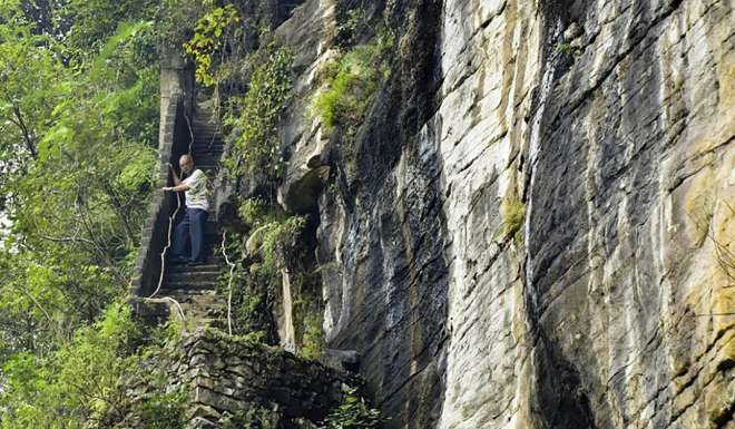 Liu makes his way up the mountain. Photo: SCMP Pictures