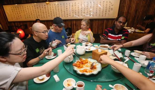 Members of Meat Free Hong Kong enjoy a vegetarian meal in Central. Photos: David Wong