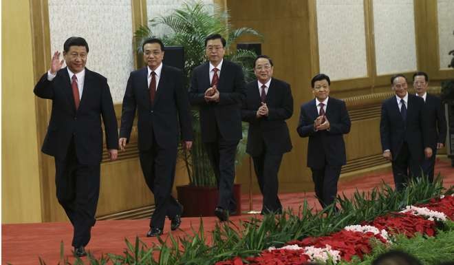 Xi Jinping leads Politburo Standing Committee members into the Great Hall of the People in Beijing in November 2012. Photo: Reuters