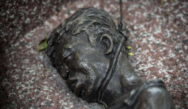 An image of a lynched student on a memorial commemorating the October 6, 1976 student massacre. Photo: AFP