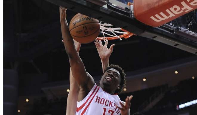 The Houston Rockets Isaiah Taylor shoots in the second half.