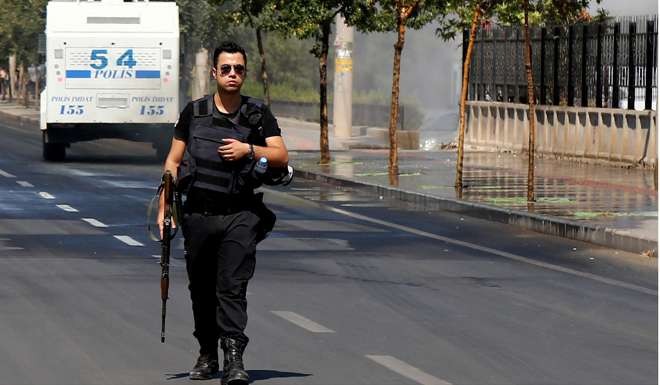 A riot policeman on patrol. Photo: Reuters