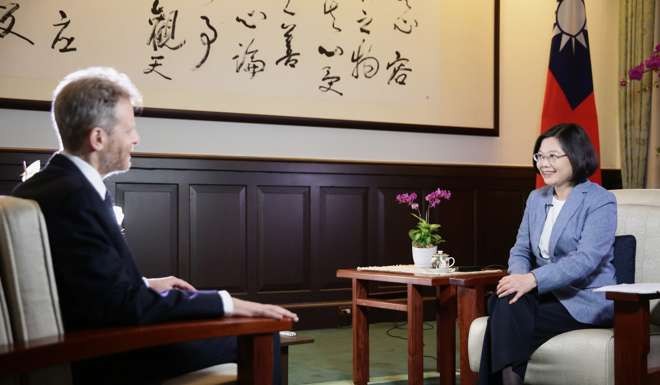 Taiwan’s President Tsai Ing-wen (right) is interviewed by Charles Hutzler, The Wall Street Journal's Beijing bureau chief, in Taipei on Tuesday. Photo: EPA
