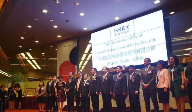 Postal Savings Bank of China’s listing ceremony at the Hong Kong Stock Exchange last month. It was the biggest IPO globally in two years. Photo: Xiaomei Chen