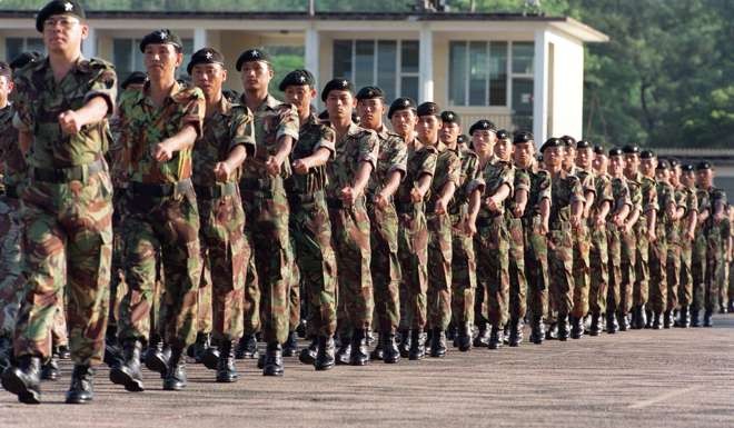 Gurkha soldiers parade in Hong Kong before the handover in 1997. Photo: K.Y. Cheng
