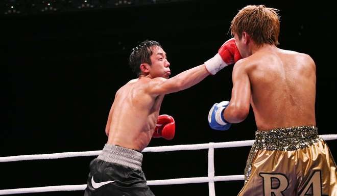 Rex Tso connects with a right against Ryuto Maekawa.