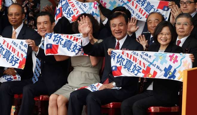 Taiwan’s President Tsai Ing-wen (right) and former president Ma Ying-jeou (second left) attend Monday’s National Day celebrations in Taipei. Photo: Reuters