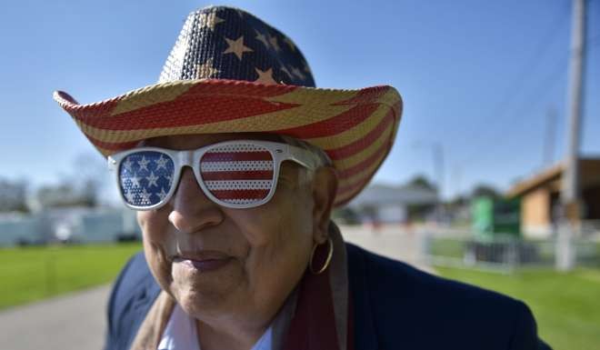 A supporter of Donald Trump waits for him at the Wisconsin Fall Fest on October 8 at the Walworth County Fairgrounds in Elkhorn, Wisconsin. Photo: AFP