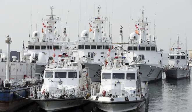 South Korean cost guard vessels anchor at a port in Incheon. PhotoL AP