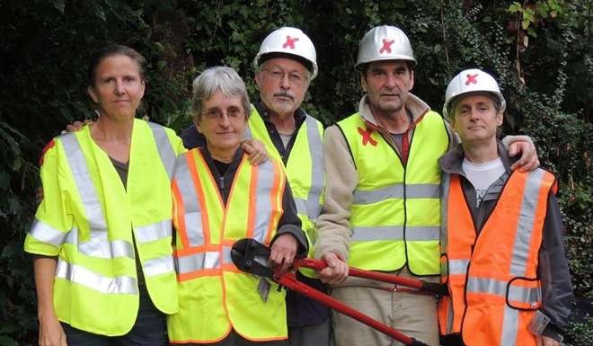 Activists from Climate Direct Action who took part in a coordinated shutdown of Canada-US oil pipelines on Tuesday. Photo: Climate Direct Action