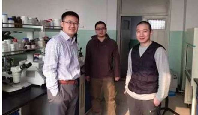 Han Chunyu (right) and his colleagues at their laboratory in Shijiazhuang, Hebei. Photo: SCMP Pictures