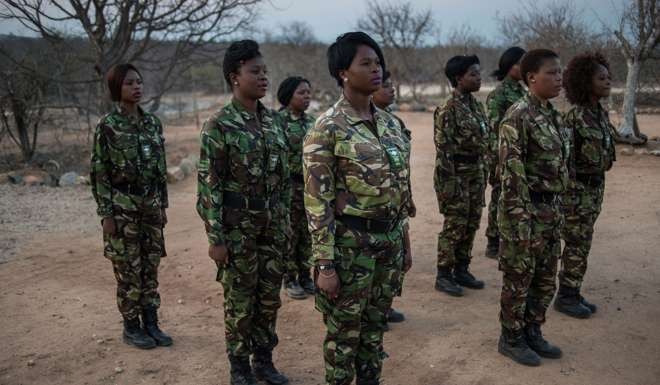 Female members of the “Black Mamba” anti-poaching team prepare for night patrols in the Limpopo province of South Africa last month. Nearly 600 rangers worldwide have been murdered since 2009 while protecting targeted species. Photo: AFP