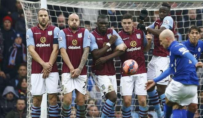 Aston Villa defend a freekick against Leicester City in a match at Villa Park last season. The club were later relegated for the first time in 28 years. Photo: Reuters