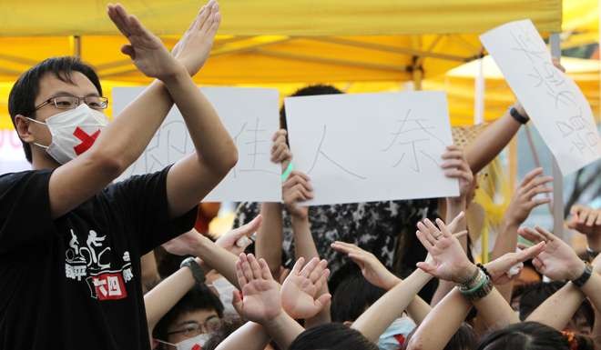 Early signs of discontent as post-80s protesters demonstrate during a forum at Victoria Park on the passing of the political reform package, on June 27, 2010. Photo: Dickson Lee
