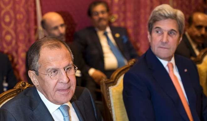 Sergei Lavrov and John Kerry during the meeting. Photo: AFP