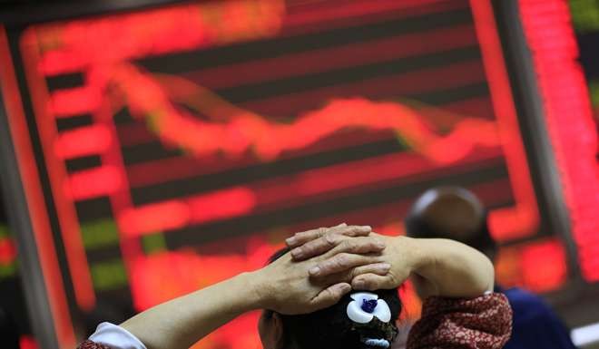 Capital flow south from Shanghai on the stock connect trading link with Hong Kong has slumped in recent days, but analysts expect the new link between Hong Kong and Shenzhen will bolster numbers. Photo: EPA