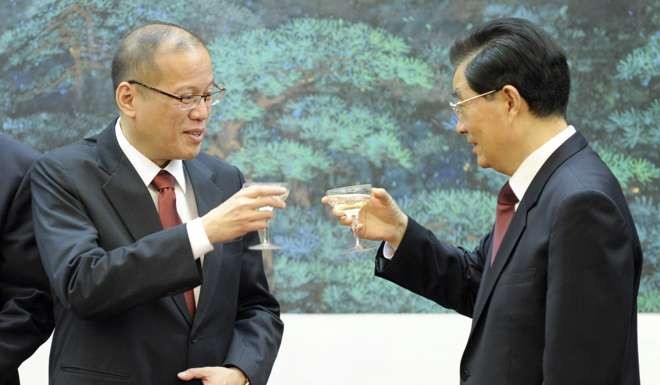 Former Philippine president Benigno Aquino (left) meets then Chinese leader Hu Jintao in 2011. Aquino also claimed Chinese ancestry, but ties with China soon nosedived. Photo: AFP