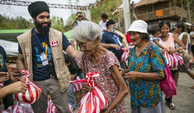 Sikhs help typhoon victims in the Philippines. Photo: SCMP Pictures