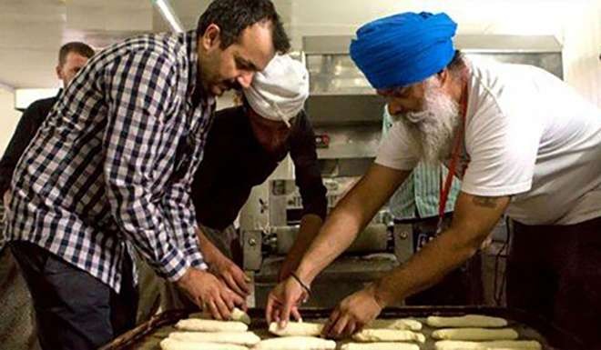 The Sikh charity Langar Aid distributes free bread from its bakery near the Syrian border. Photo: Langar Aid