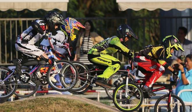 Young riders take to the race track at the Hong Kong International BMX Park in Kwai Chung on November 22, 2014. Photo: Sam Tsang