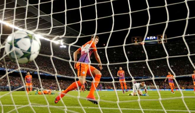 Lionel Messi (not pictured) scores their first goal as Manchester City's John Stones and Claudio Bravo look onAction Images via Reuters / John SibleyLivepicEDITORIAL USE ONLY. TPX IMAGES OF THE DAY