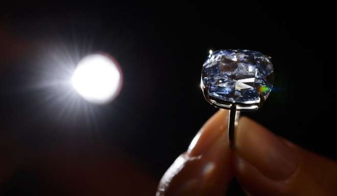 The 12.03-carat blue diamond purchased by Hong Kong tycoon Joseph Lau for US$48 million. Photo: AFP