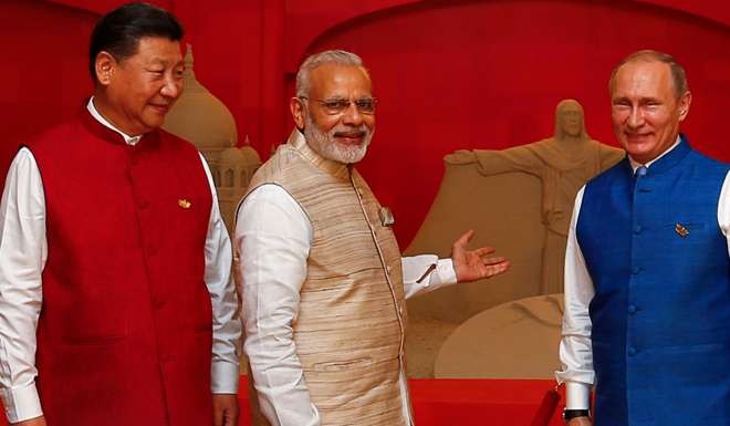Chinese President Xi Jinping (left), Indian Prime Minister Narendra Modi (centre) and Russian President Vladimir Putin at the Goa summit last weekend. Photo: Reuters