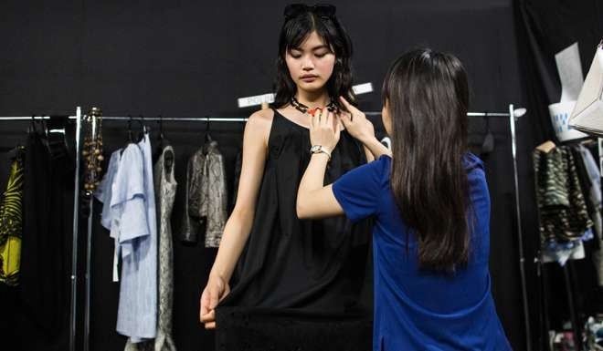 Japanese model Rina Fukushi prepares for a show by designer Tae Ashida. Photo: AFP