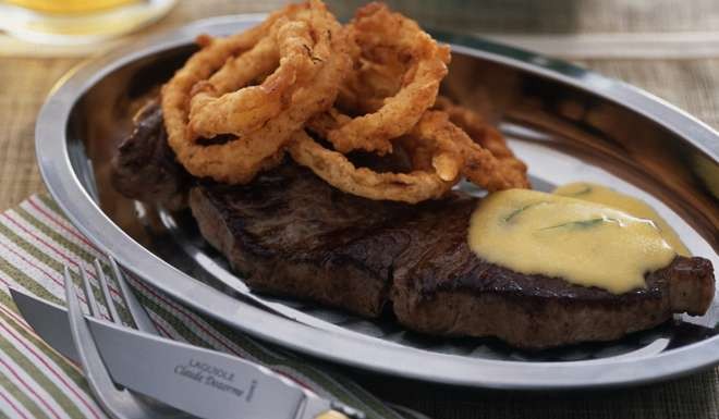 Steak Bearnaise with fried onion rings. Koji Studio