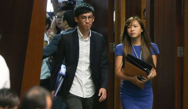 Sixtus Baggio Leung Chung-hang, with Yau Wai-ching, says he is still discussing things with his lawyers. Photo: Sam Tsang