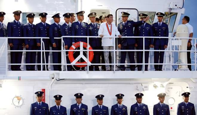 Philippines President Rodrigo Duterte visits the newly inaugurated Japan-built patrol ship during a ceremony marking the anniversary of the Philippines Coast Guard in Manila. Photo: Reuters