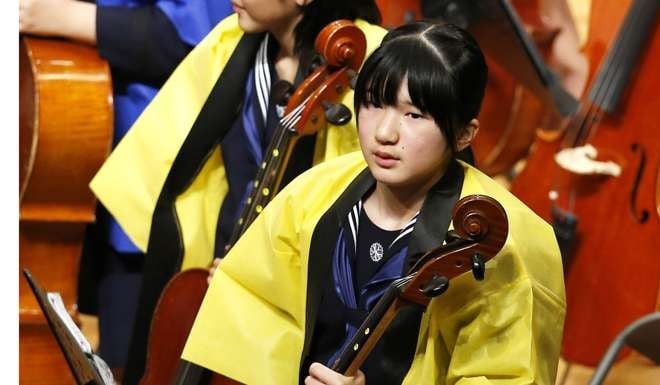 Japanese Princess Aiko plays the cello at a concert in Tokyo in 201. File photo: AP