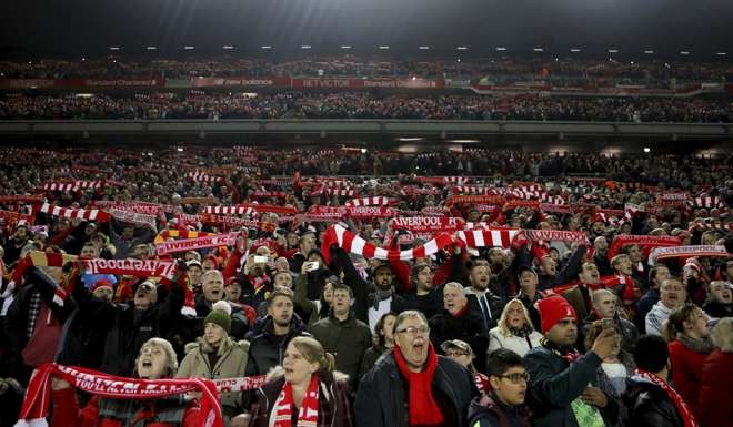 Liverpool fans in full voice during the English League Cup against Tottenham Hotspur at Anfield. Photo: AP