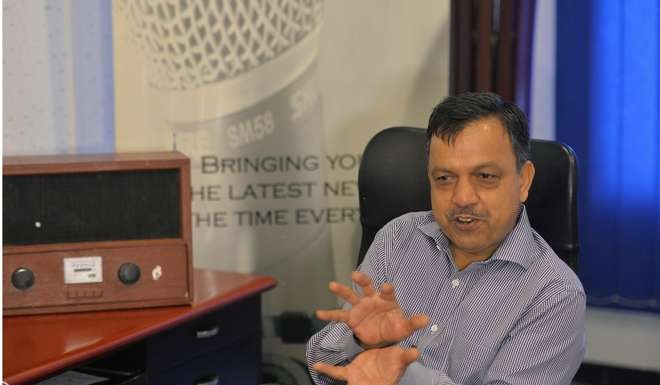 Najib Ahmed, director of Islamabad-based Power 99 FM radio, speaks during an interview at the station in Islamabad. Photo: AFP