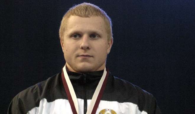 World record holder Belarussian Andrei Rybakov on the podium during the presentation ceremony in the mens 85kg snatch category in the World Weightlifting Championships held in Doha, Qatar. Nine more athletes, including six medal winners, were retroactively disqualified from the 2008 Beijing Olympics on Wednesday after failing retests of their doping samples. Stripped of silver medals were weightlifters Olha Korobka of Ukraine (75 kg) and Rybakov. Photo: AP