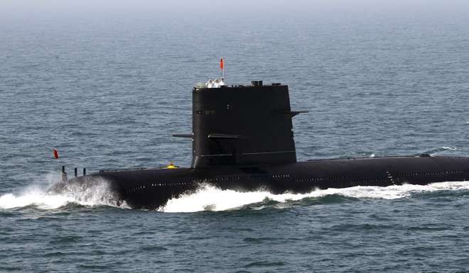 Chinese sailors salute on top of a submarine during a fleet review at a Sino-Russian joint naval exercise in the Yellow Sea in April 2012. Photo: Reuters