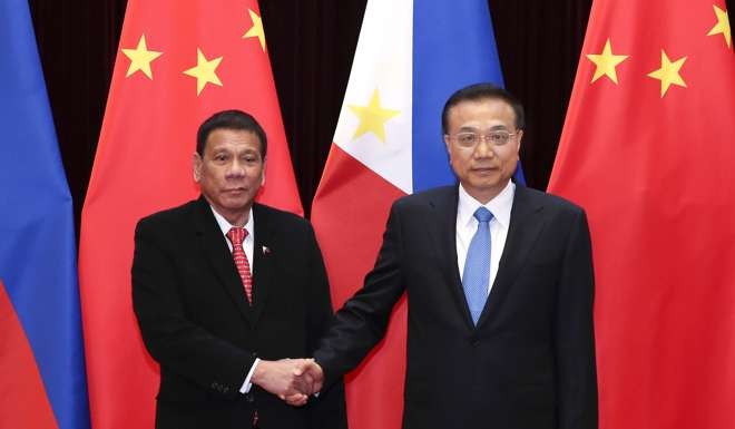 Chinese Premier Li Keqiang meets with Philippine President Rodrigo Duterte at the Great Hall of the People in Beijing, capital of China. Photo: Xinhua