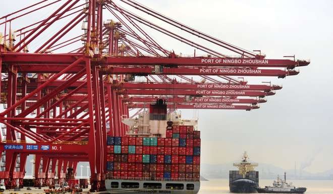 A ship loaded with container boxes is seen at a port in Ningbo, Zhejiang province, China. Photo: Reuters