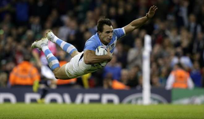 Juan Imhoff scores a try for Argentina during last year’s Rugby World Cup. Photo: AP