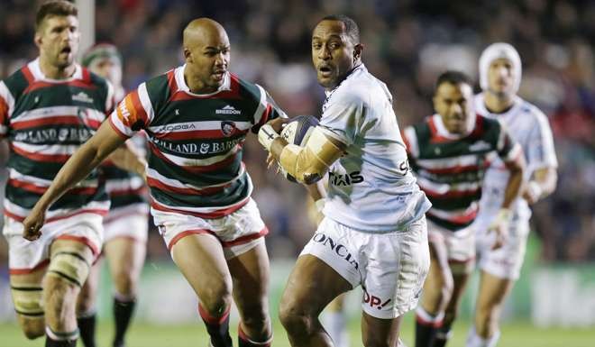 Joe Rokocoko outruns his Leicester opponent during the Champions Cup. Photo: Reuters