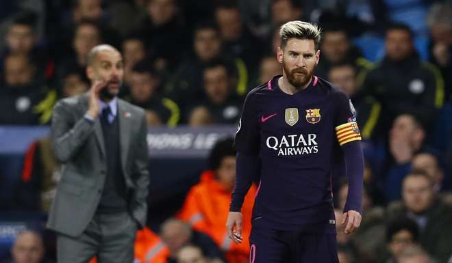 Manchester City manager Pep Guardiola and Barcelona's Lionel Messi Action Images via Reuters / Jason Cairnduff