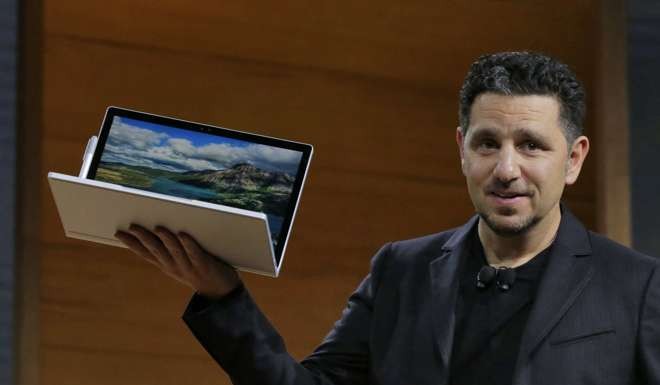 Microsoft’s Panos Panay displays the company’s new Surface Book. Photo: AP