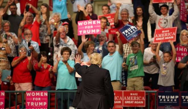 Donald Trump works the crowd at the Cabarrus Arena 7 Events Centre in Concord, North Carolina, on Thursday. Photo: AFP