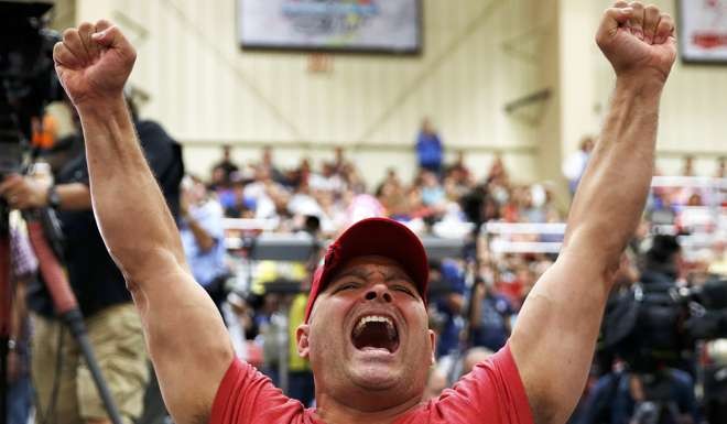A supporter of Republican presidential nominee Donald Trump is pictured during a campaign event in Concord, North Carolina, on Thursday. Photo: Reuters